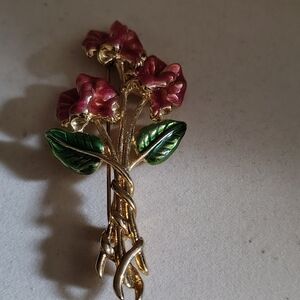 Elegant Floral Brooch with Red and Green Accents